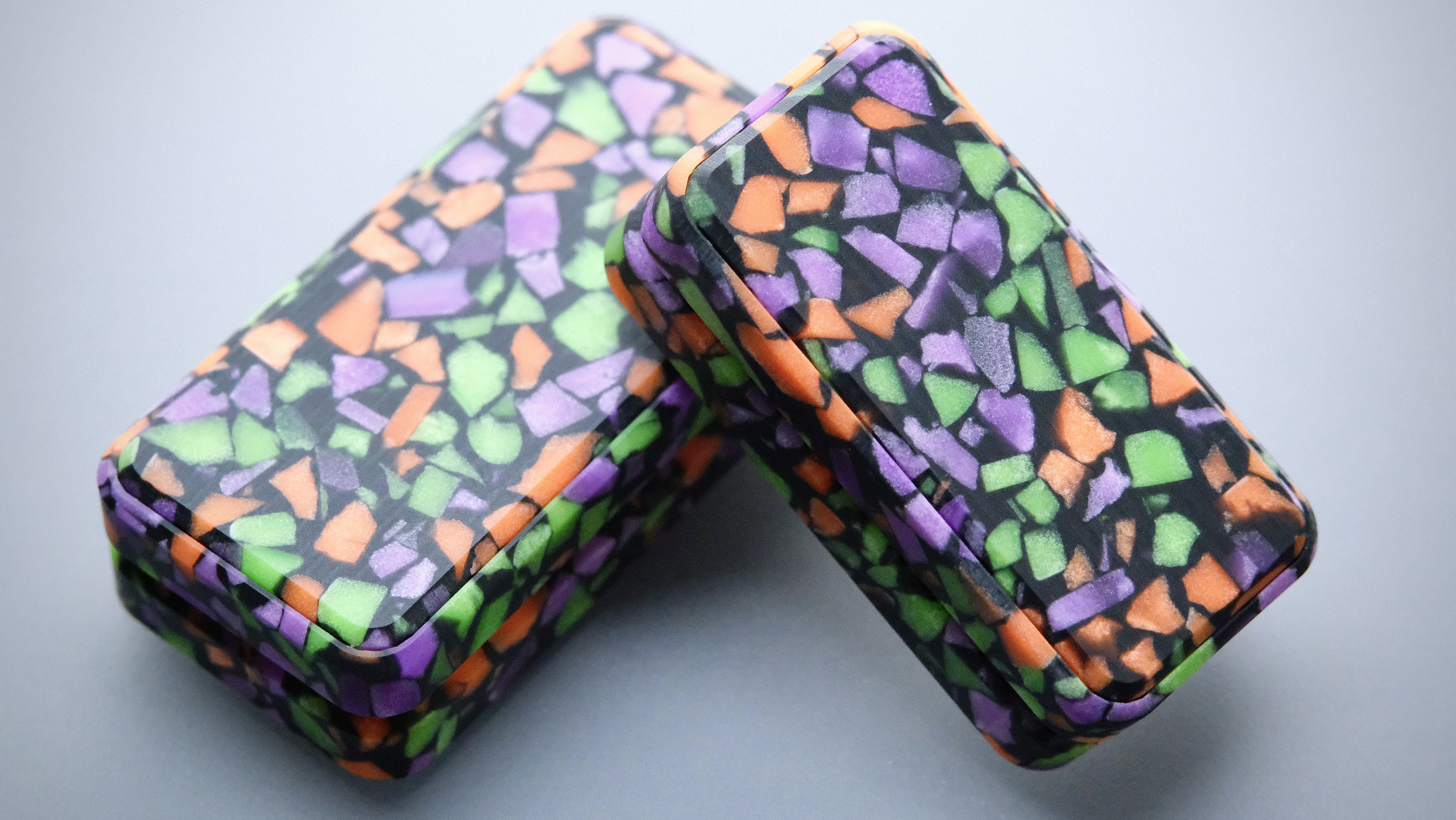 Midnight Terrazzo Clicker - Colorful speckled fidget on dark background